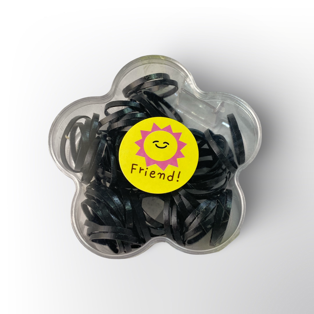 Ligas Negras ✨ – Paquete de ligas elásticas en caja con diseño de flor, prácticas y resistentes para el uso diario.