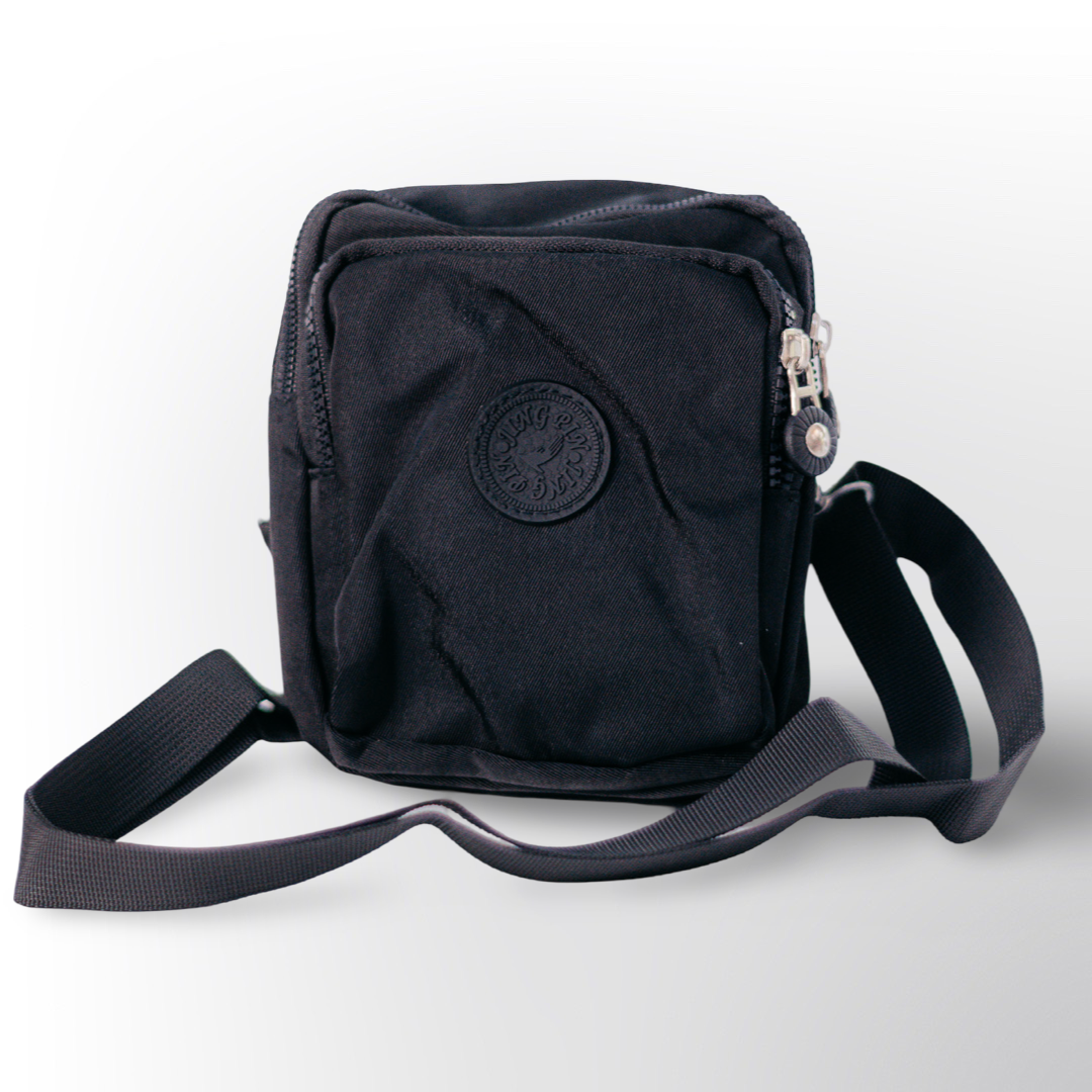 Mini Bolso Casual 🎒 – Práctico y ligero, ideal para uso diario. Con varios compartimentos con cierre y correa ajustable para mayor comodidad