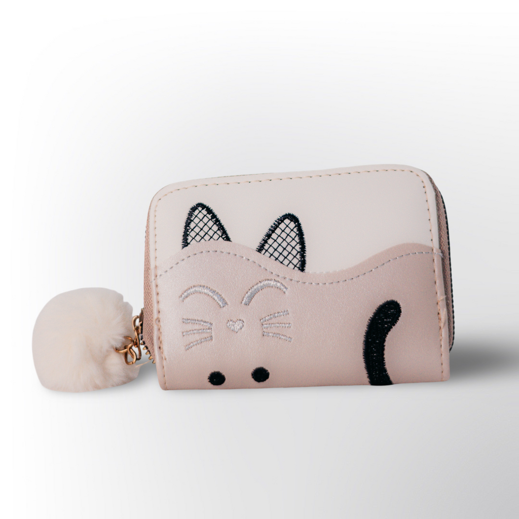 Mini Cartera con Pomponcito ✨ – Diseño compacto y adorable con cierre de cremallera.